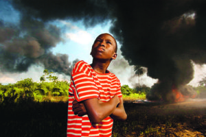 George Osodi, Ogony Boy, from the series Oil Rich Niger Delta, 2007 © Courtesy George Osodi and Z Photographic Ltd.